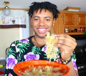 konscious karl holding sea moss in kitchen, close up photo. 